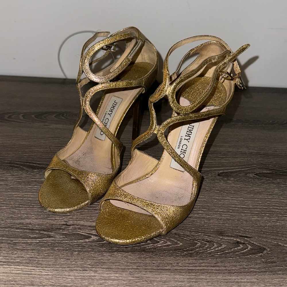 Jimmy choo gold glitter lance 37

Pre-loved condition.